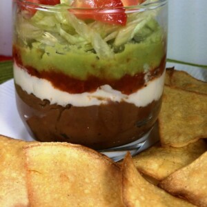 Layered Bean Dip with Baked Corn Chips
