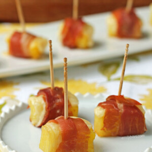Cheesy Pineapple Prosciutto Bites on a plate