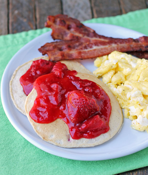 Strawberry Almond Cream Pancakes with eggs and bacon