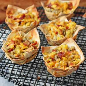 Breakfast Wonton Cups lined up on a cooling rack