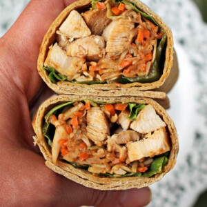 Thai Peanut Chicken Wrap in hand