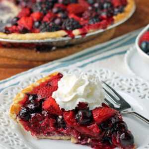 Mixed Berry Pie slice with whipped cream