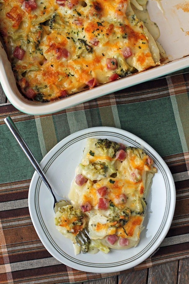 Ham and Cheese Au Gratin Potato Bake slice on a plate