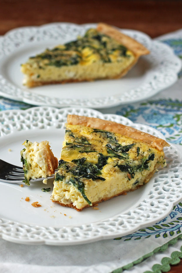 Spinach Feta Quiche slice on a plate