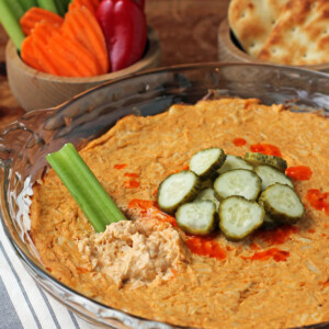 Nashville Hot Chicken Dip with celery dipped