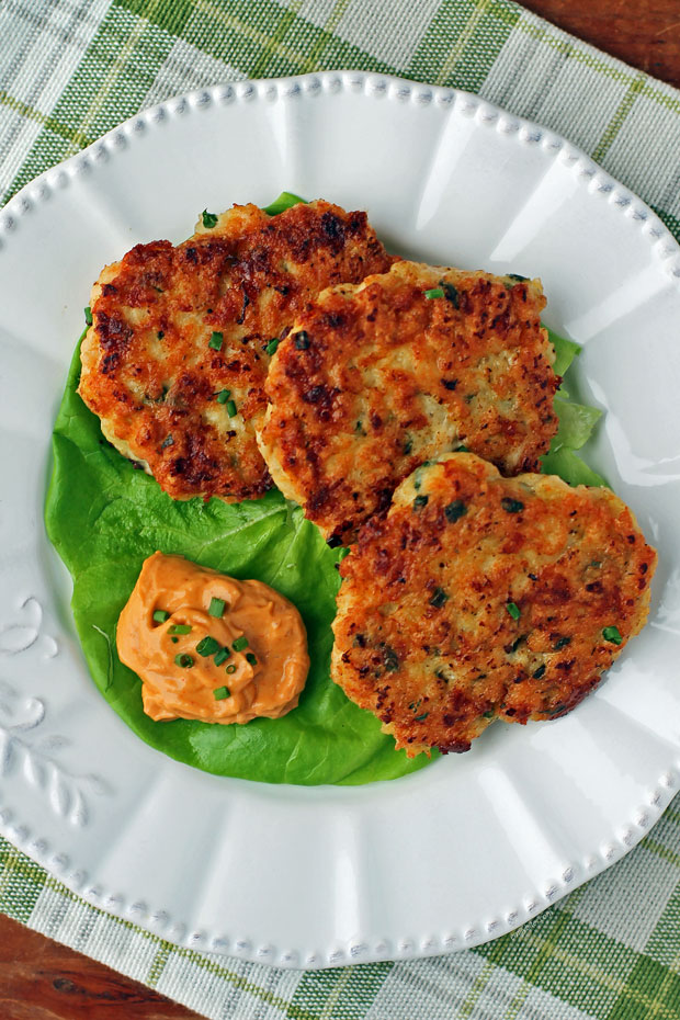 Herb and Cheese Chicken Fritters plated with dip