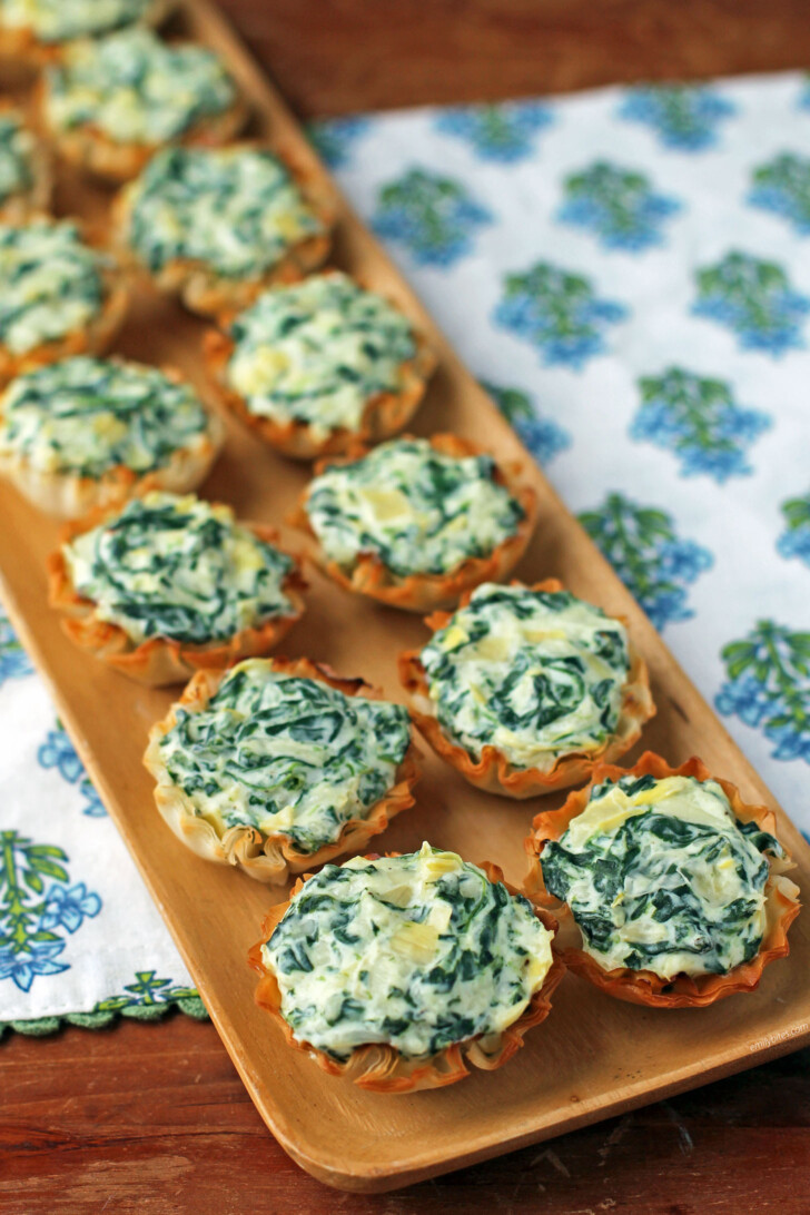 Spinach Artichoke Dip Tartlets on a tray