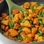 Honey Turmeric Chicken and Green Bean Skillet stirred in pan