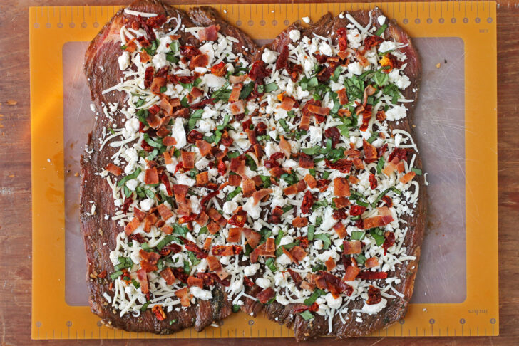 Stuffed Balsamic Flank Steak Pinwheels open with filling