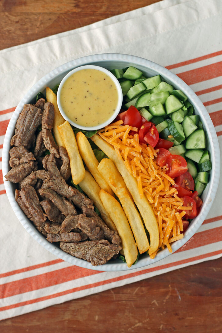 Pittsburgh Steak Salad with Warm Riviera Dressing overhead shot in a bowl