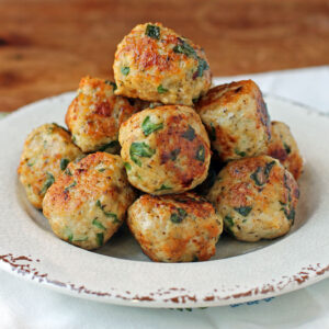 Greek Chicken Meatballs in a pile on a plate