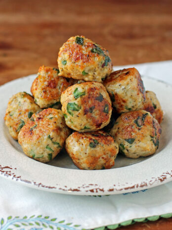 Greek Chicken Meatballs in a pile on a plate