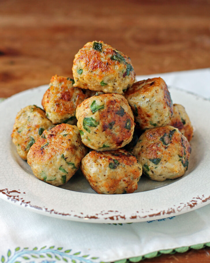 Greek Chicken Meatballs in a pile on a plate