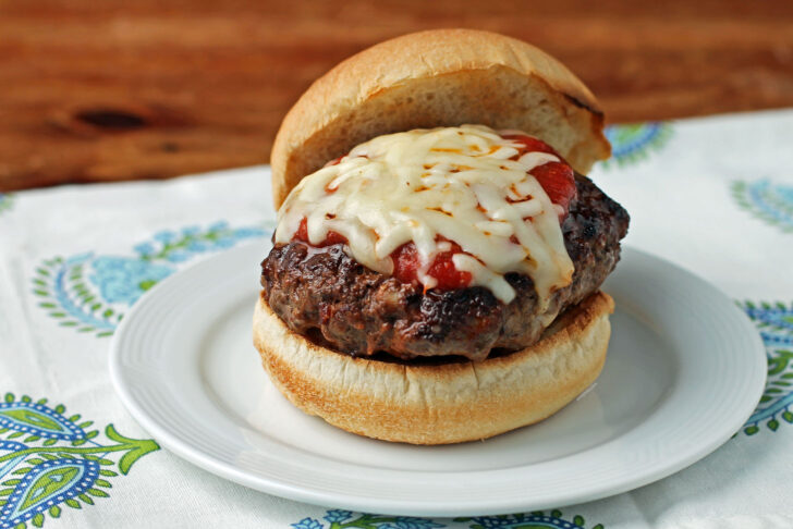 Stuffed Pizza Burger plated with lid off