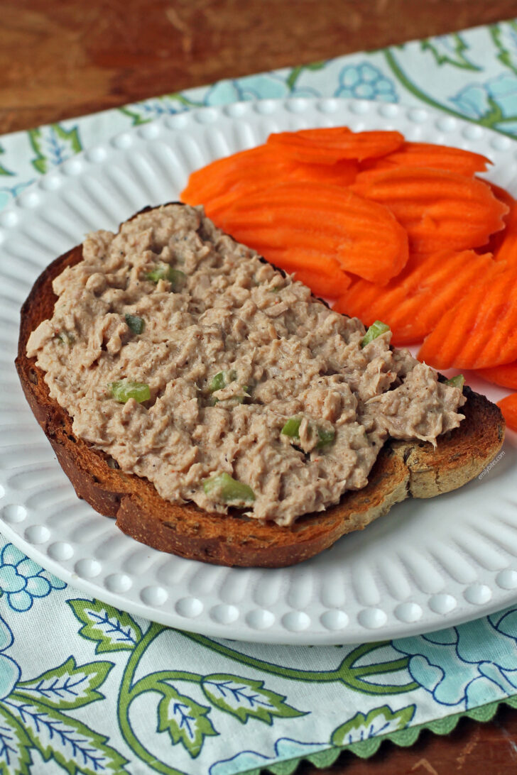 Easy Tuna Salad on rye toast plated with carrots